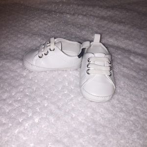 White and navy blue sneaks